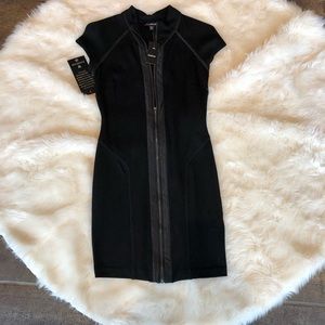 Bebe zip front black dress. Stretchy!